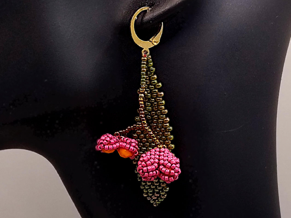 Spindle Berries earring in hand (for size estimate)