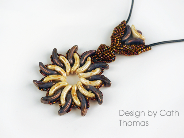Sun Bow pendant with winged heart bail