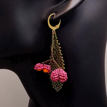 Spindle Berries earring in hand (for size estimate)