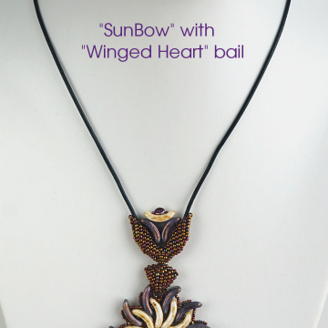 Sun Bow pendant with winged heart bail